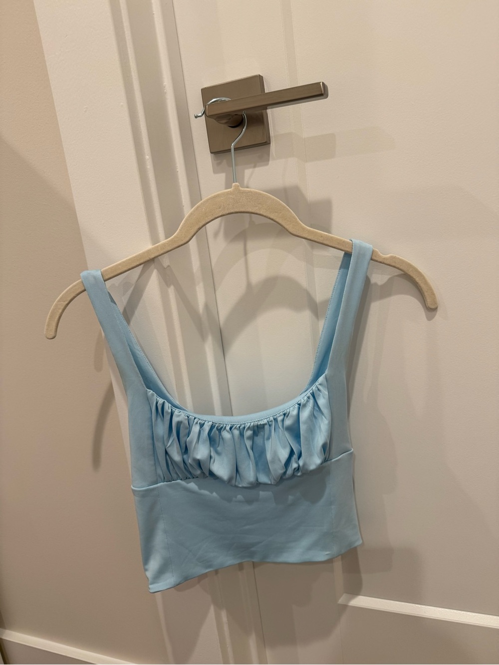 Light Blue Ruffle Front Cropped Tank